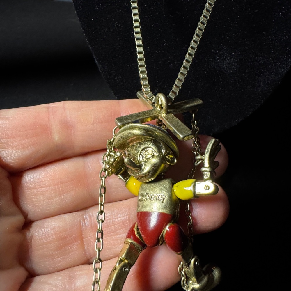 Gold and Red Pinocchio Pendant Necklace when you wish upon a star. Disney - Picture 2 of 5